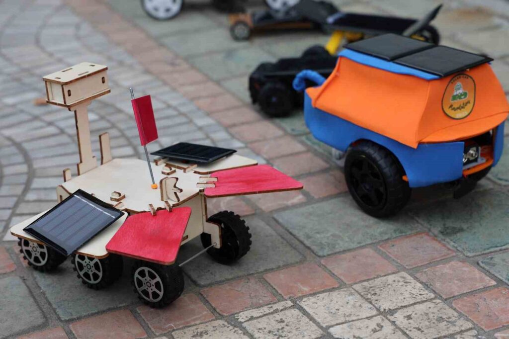 Miniature vehicles powered by solar energy were exhibited