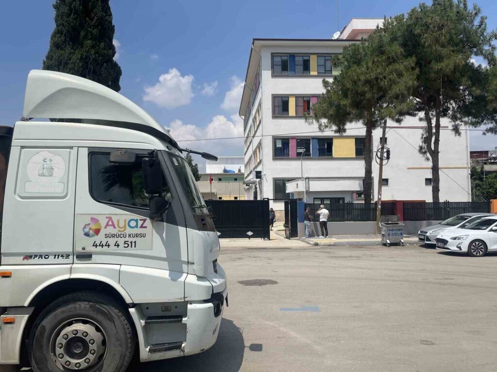Parents protest truck driving training in front of elementary school